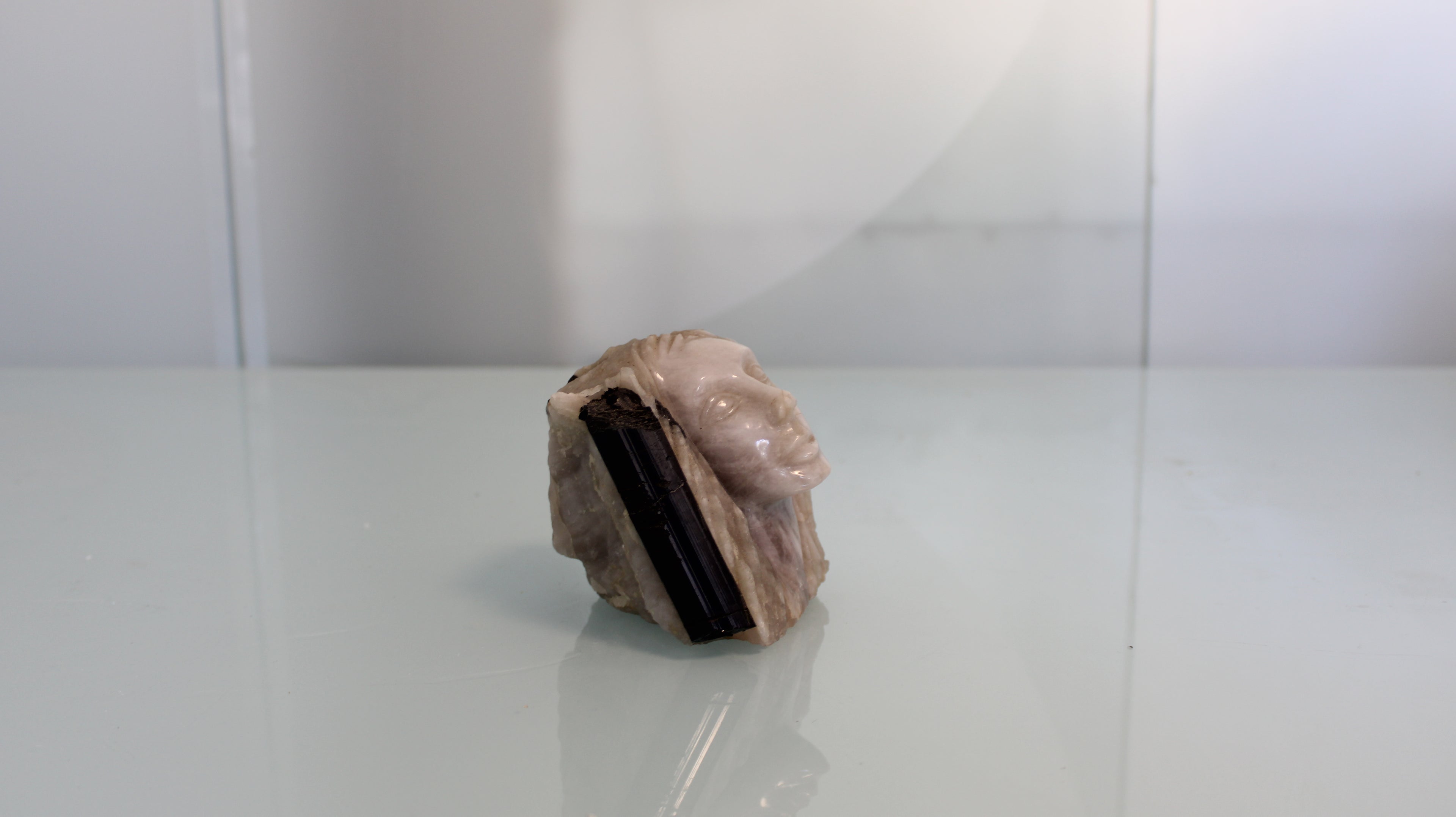 Female Face Sculpture in Emerald Canga – Handcrafted Work in Natural Stone