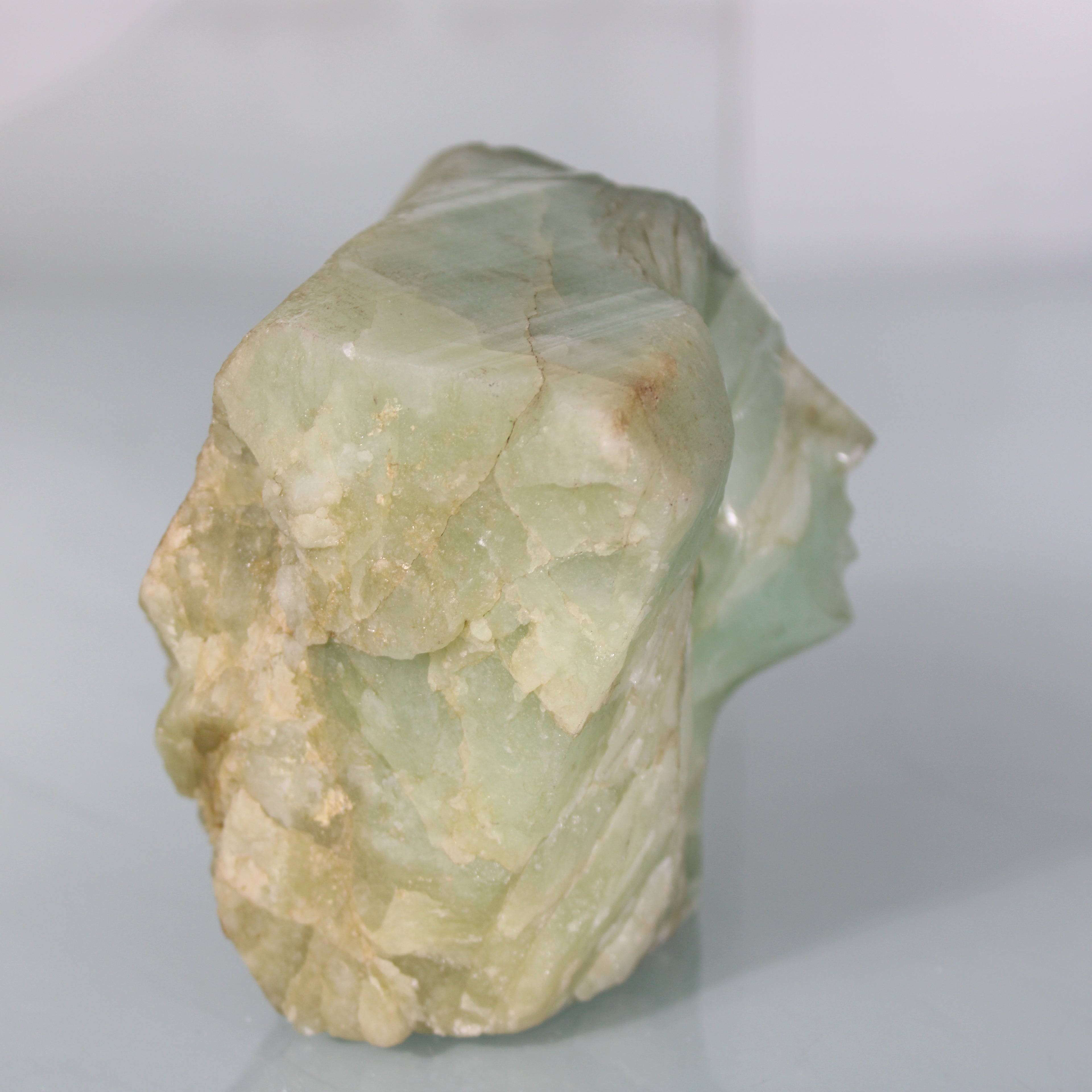 Handmade Aquamarine Sculpture – Stone Carved Face with Serene Expression