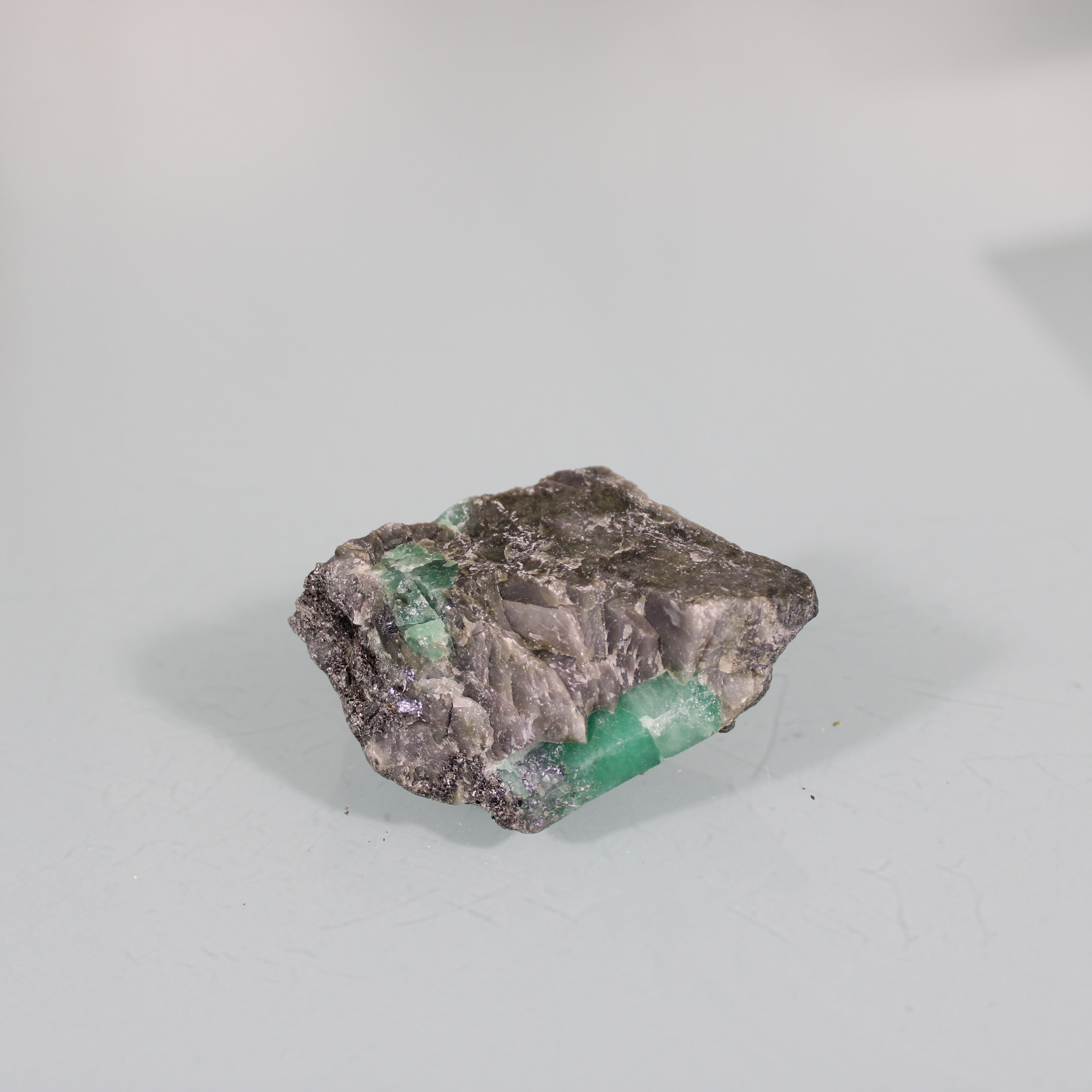 Emerald in Dark Matrix – Green Crystal in Natural Highlight