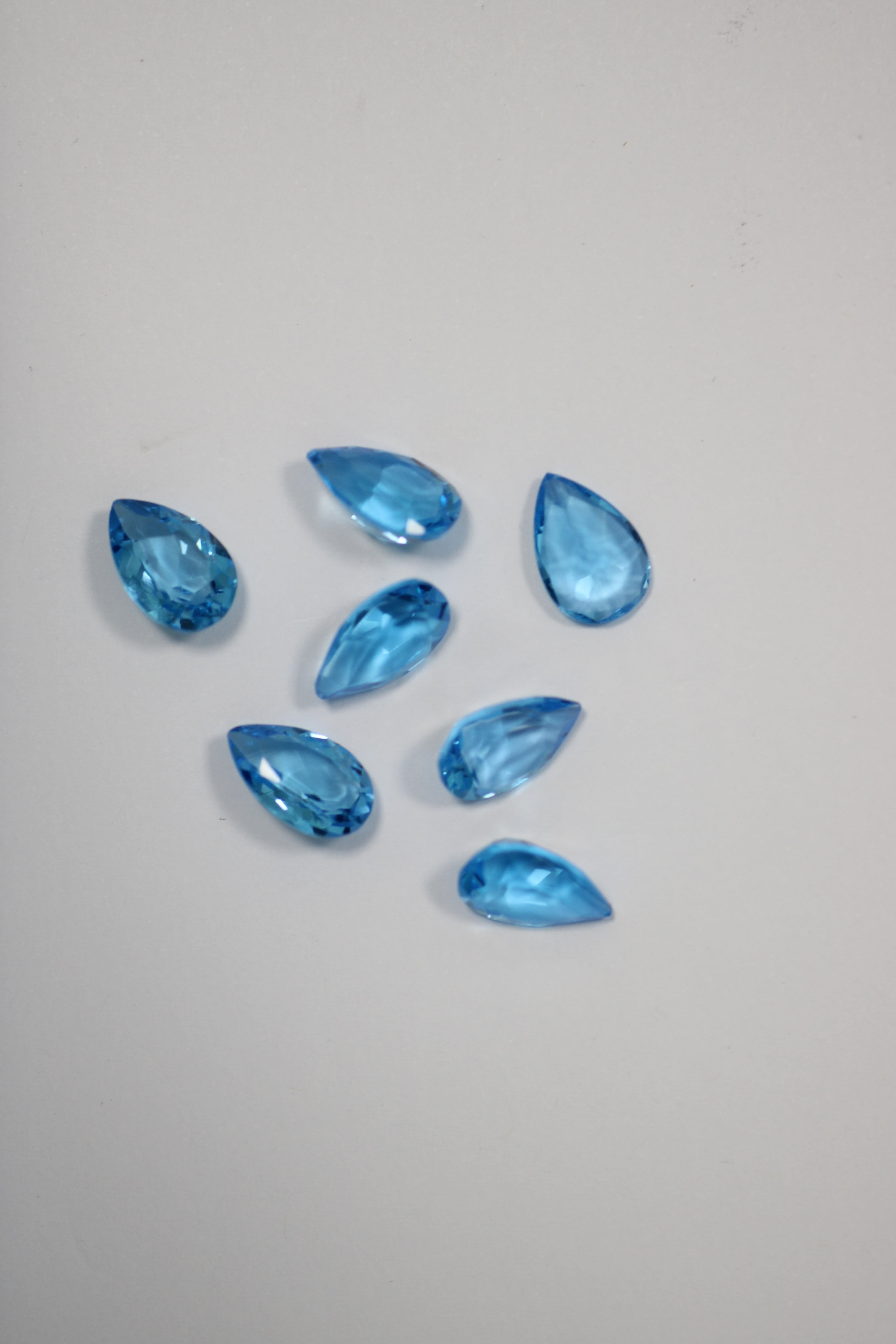 Topázios Gota Azul Suisse 8 x 12 mm – Lote de 7 Unidades (24,10 ct)
