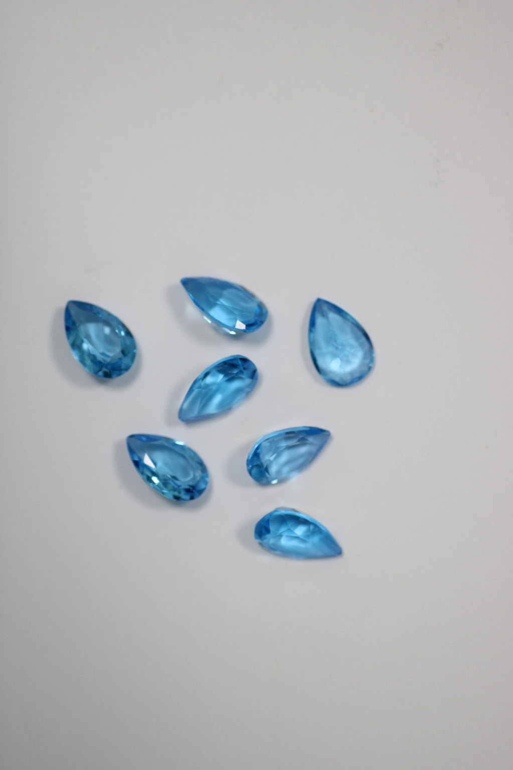Topázios Gota Azul Suisse 8 x 12 mm – Lote de 7 Unidades (24,10 ct)